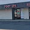 Happy family foot massage photo